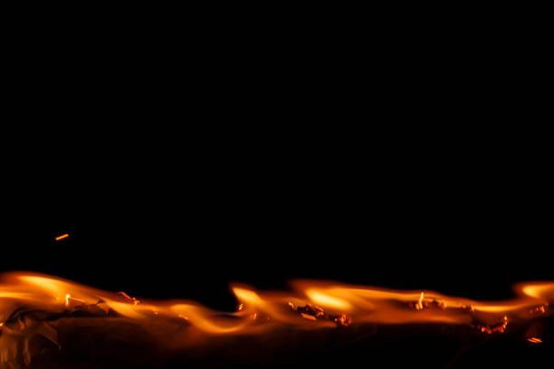 Danger flames: hot flame heat fire abstract on a black background.