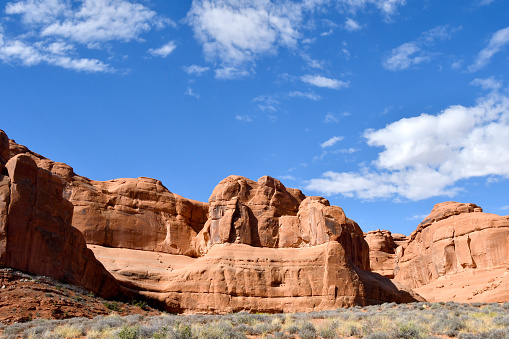 In Eastern Utah Arches National Monument Desert Photo Series (Shot with Canon 5DS 50.6mp photos professionally retouched - Lightroom / Photoshop - original size 5792 x 8688 downsampled as needed for clarity and select focus used for dramatic effect)