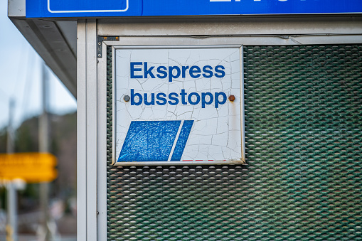 Lindesnes, Norway - december 23 2023: Express bus stop sign on the side of a bus stop.