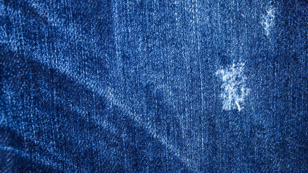 istock blue denim jeans texture.  blue denim jeans background.  pattern.  abstract 2021191979