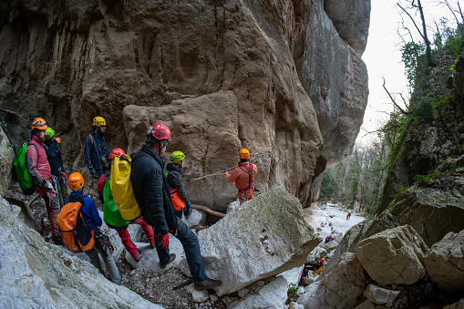 Monte San Vito, Umbria, Italy - 18 February 2024: Pago le Fosse is a real natural canyon in the heart of Valnerina, deeply engraved on a gigantic fault.  As shown in the image, it is frequented by numerous groups of tourists