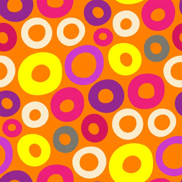 Vector illustration of Small different bright colorful multi-colored circles isolated on an orange background. Cute geometric seamless pattern. Vector simple flat graphic illustration. Texture.