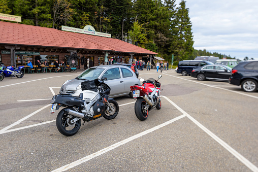 Mummelsee, Germany - Sep 22, 2018: new Sport Yamaha Deltabox II Dyno Jet parked on dedicated space near hiking road in the Black Forest - tilt-shift lens used