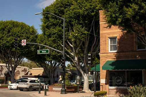 Tustin, California, USA - October 22, 2023: Afternoon sun shines on the historic buildings of downtown Tustin.