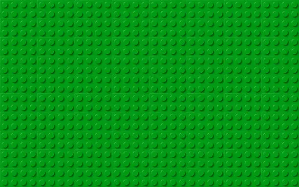 Vector illustration of Green plastic toy blocks. Modern vector bricks background. Plastic construction plate. Simple vector illustration