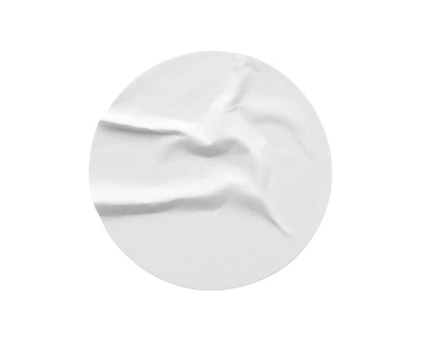 istock Blank white round paper sticker label isolated on white background 2021347950