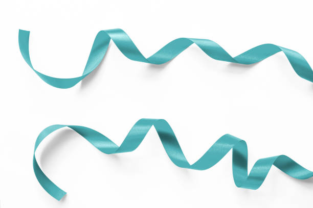 Teal green blue satin ribbon confetti bow scroll hanging set isolated on white background with clipping path for holiday and wedding card design decoration