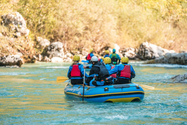 istock Guided Rafting Journey for Diverse Mid Adults on Mountain River 2021351233