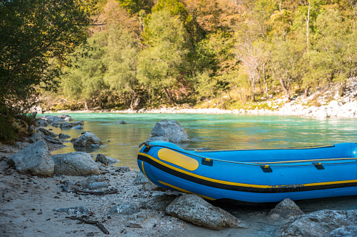 Bright Blue Raft Blue Inflatable Raft On A River Bank Stock Photo - Download Image Now ...