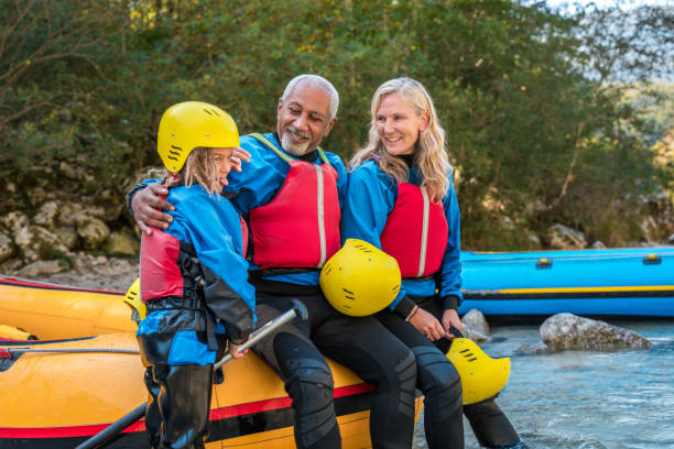 istock Happy Diverse Family Geared Up for River Rafting Thrills 2021351764
