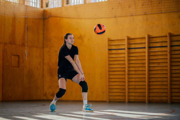 istock A volleyball player is hitting an passing a ball on training. 2021361014