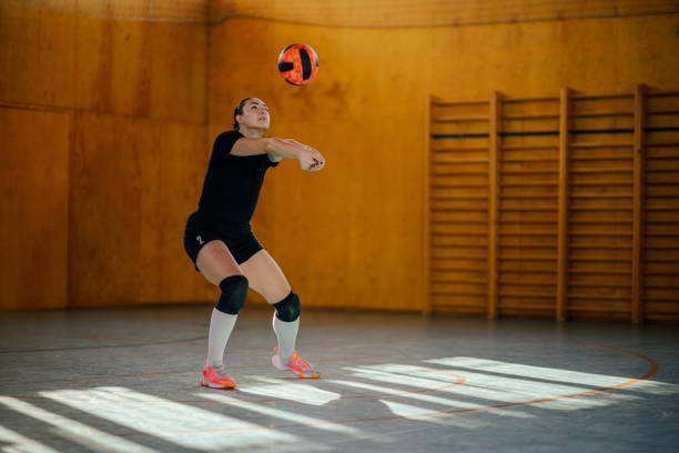 istock A young volleyball player is hitting and passing the ball on training. 2021361016