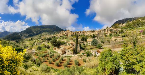 istock View of a hillside village bathed in sunlight in Majorca 2021361544
