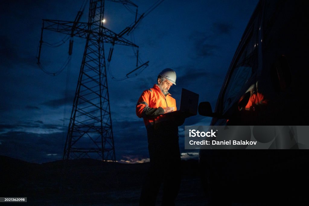 Engineering Electric Utility Green Energy Electrical Engineer Working At Night Stock Photo ...