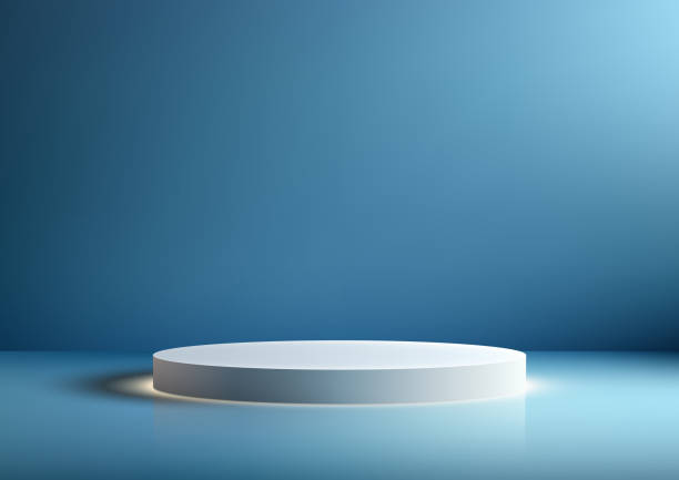 istock White geometric podium mockup. Minimalist design and a calming blue background, this 3D illustration is perfect for showcasing your products in style 2021386271