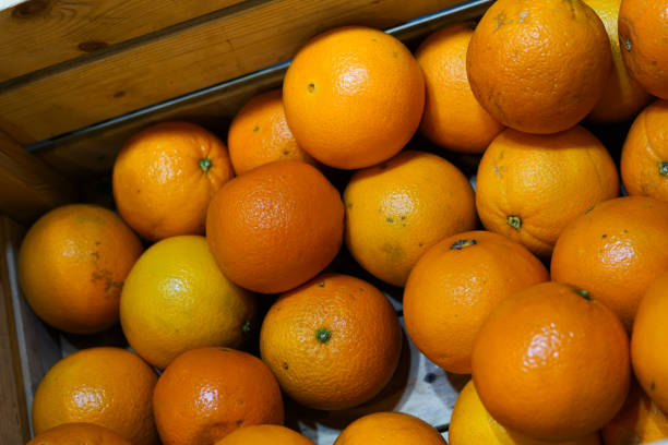 istock Oranges in the wooden box. 2021419106