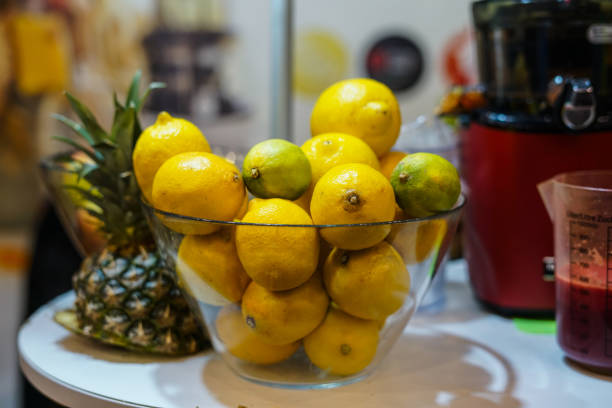 Lemons and limes in a bowl. Close up.