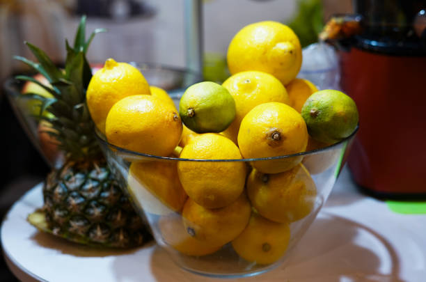 Lemons and limes in a bowl. Close up.