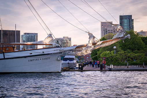 Toronto, Ontario, Canada - 2019 06 09: One of the most popular Toronto s attractions Empire Sandy tall ship beside the pier in Toronto Harboufront. Classic schooner provides chartered tours for the public from Toronto, Canada