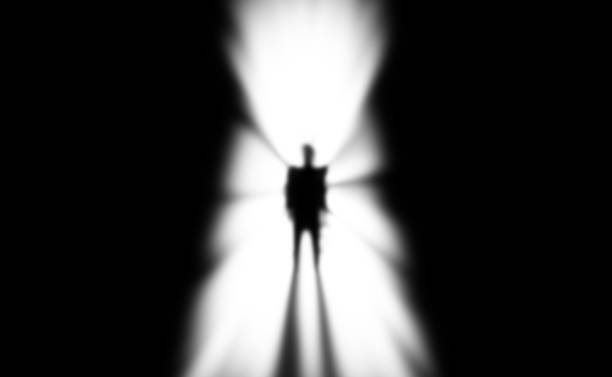 istock Businessman in a suit in front of the keyhole. Solution for problematic business concept 2021447921