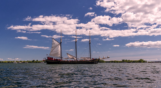 Toronto, Ontario, Canada - 2019 06 30: Kajama tall ship in the waters of Toronto Harbour. Kajama is a three-masted former cargo schooner, that currently operates on Lake Ontario as a cruise ship