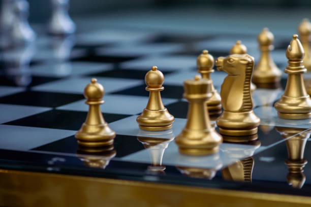 istock Chess with chess board. Pawn, horse, king and queen 2021504792