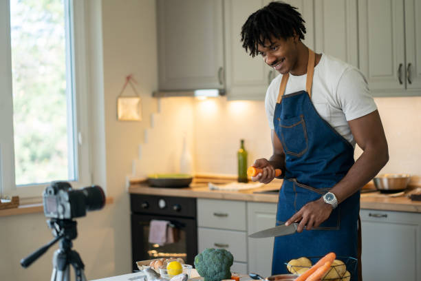 istock Male influencer recording a cooking lesson on camera 2021508745