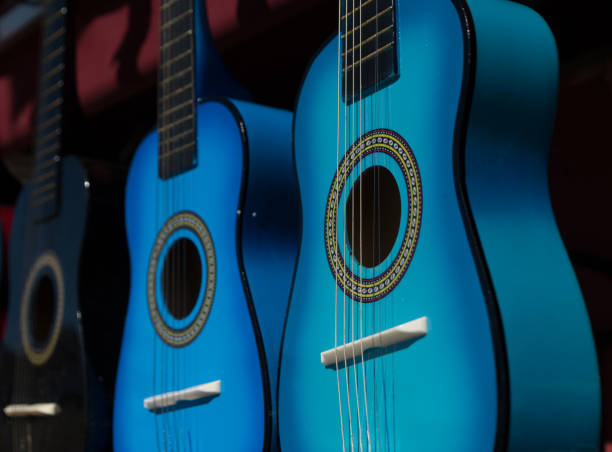 Details of colorful little wooden guitars on a stand at market in Old town, San Diego