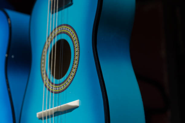 istock Stand with colorful guitars - 13 2021530847