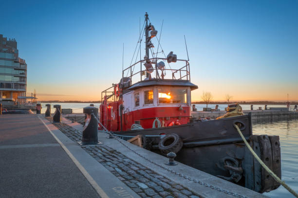 A tug boat moored at a dock in Downtown Toronto along Lake Ontario