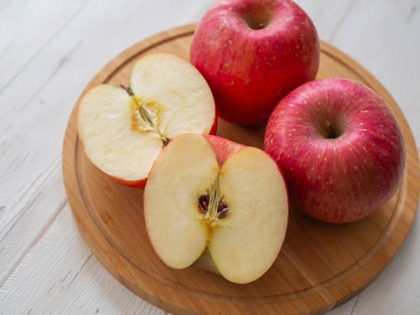 istock Japanese fuji apples on cutting board 2021681904