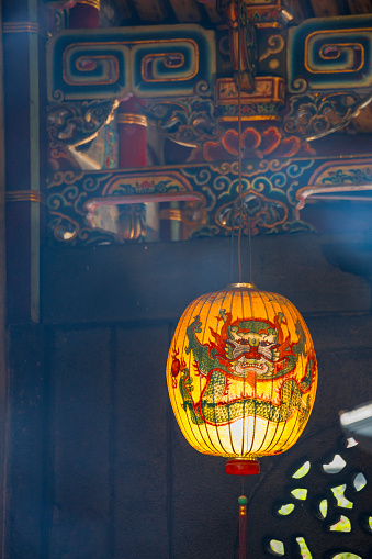 the rich colors and exquisite artistry of decorations inside a temple