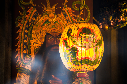 the rich colors and exquisite artistry of decorations inside a temple