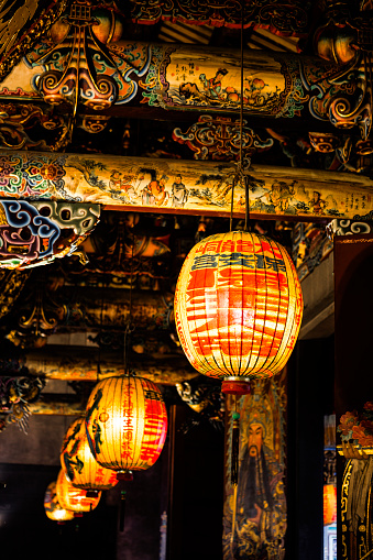 the rich colors and exquisite artistry of decorations inside a temple