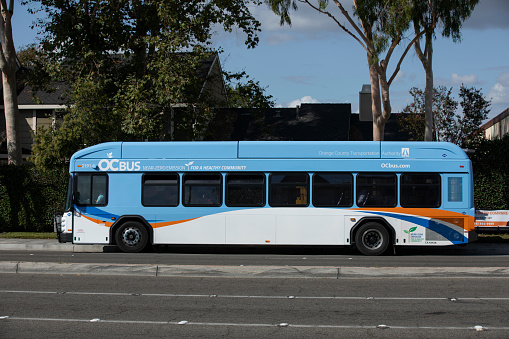Westminster, California, USA - October 1, 2023: An OCTA bus drives down Bolsa Ave.