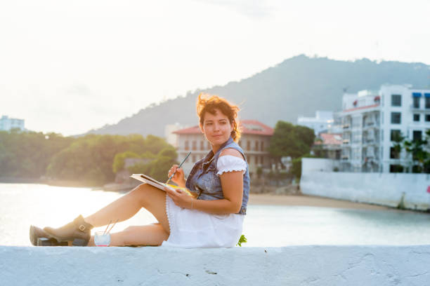 istock Woman painting in Panama 2021755719