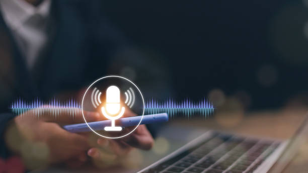 istock Voice recording. Man touching microphone icon on smart phone. Mobile application Record sound, audio, music, voice message. or Use your voice to direct AI to search for information on Internet. 2021759486