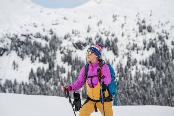 istock Backcountry skier climbing mountain 2021829891