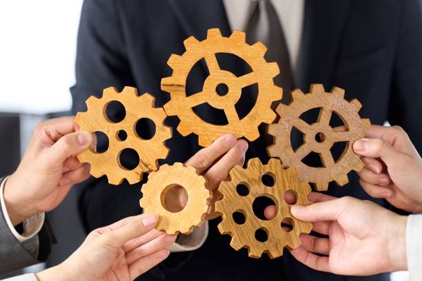 istock Business person with multiple gears 2021910068