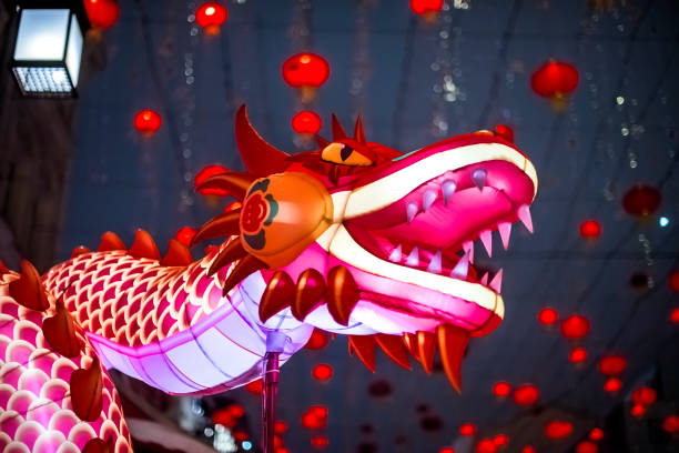 istock Red dragon in Chinese New Year. Evening festive illumination 2021947184