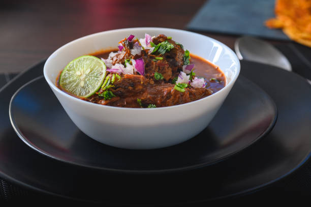 istock Bowl of Mexican Beef Birria Stew on Black Plates 2021972518