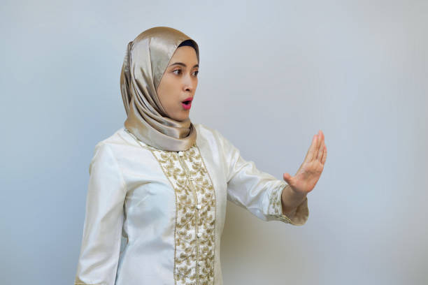 istock Young Muslim woman posing in White background studio for Ramadan or Eid Concept 2021995960
