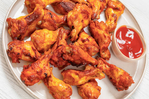 istock spicy crispy grilled chicken wings, top view 2022023500