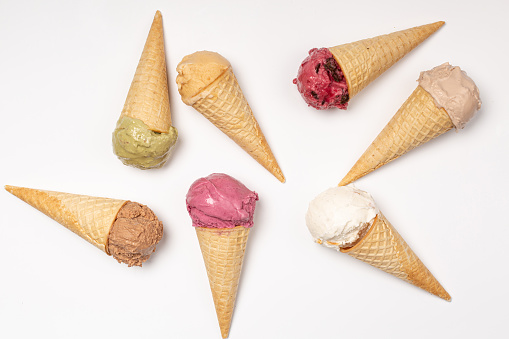 Ice cream cones of different flavors, assorted, homemade natural ice cream, white background