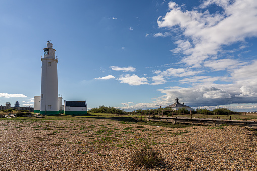 Near Milford on Sea,, Hampshire, England, UK - September 29, 2022: Clouds over the Hurst Point Lighthouse