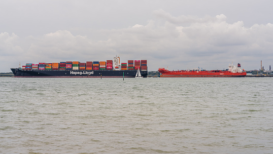 Warsash, Hampshire, England, UK - September 30, 2022: Ships crossing the Southampton water