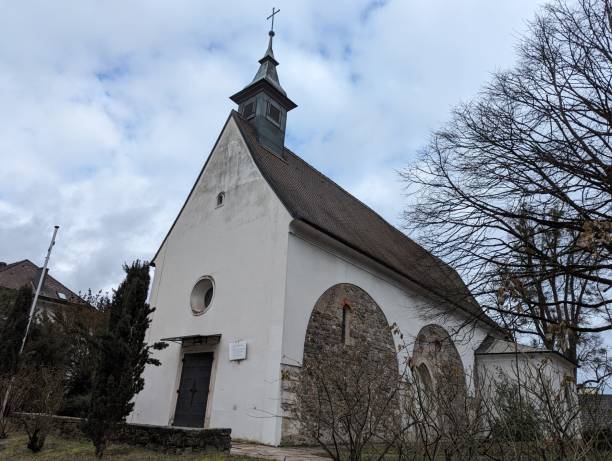 istock Antique church on a hill with a distant tower: Linz, Austria 2022110817
