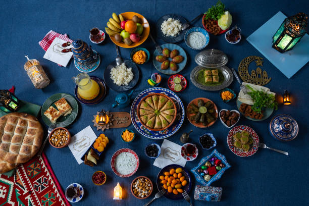 istock Ramadan Iftar Table. Muslim Family Having Dinner At Home. Iftar Table with Traditional Food. Fasting ends with Dates and Turkish Pide. Ramadan Feast Celebrations, Eid Mubarak Concept Uskudar Istanbul, Turkiye (Turkey) 2022119708