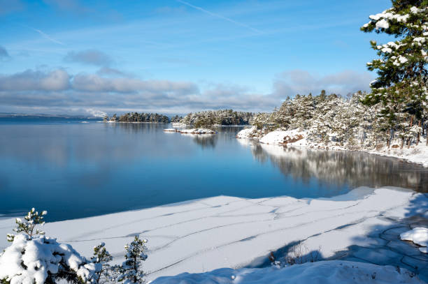 istock Beautiful view over ice and water on lake 2022145104