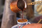 Coffee Pot (Cezve), Coffee, Turkish Coffee Cup (Turk Kahvesi) and Coffee Beans Photo, Colorful Eid Mubarak Candy and Chocolate Uskudar, Istanbul, Turkiye (Turkey)